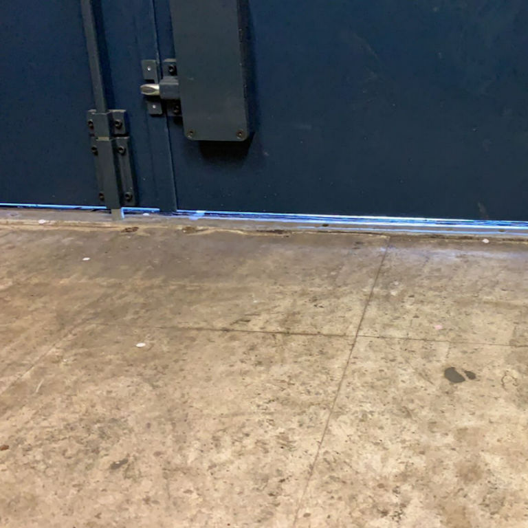 Pest Proofing Garage Door Brush Strip Before