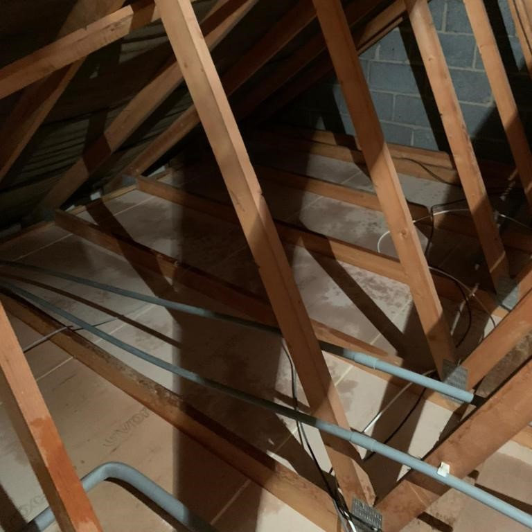 Loft Insulation Removal - Contaminated Insulation after Removal